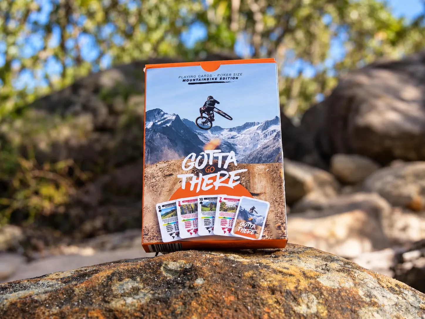 MTB Edition box standing on a rock in the bush with blue sky behind